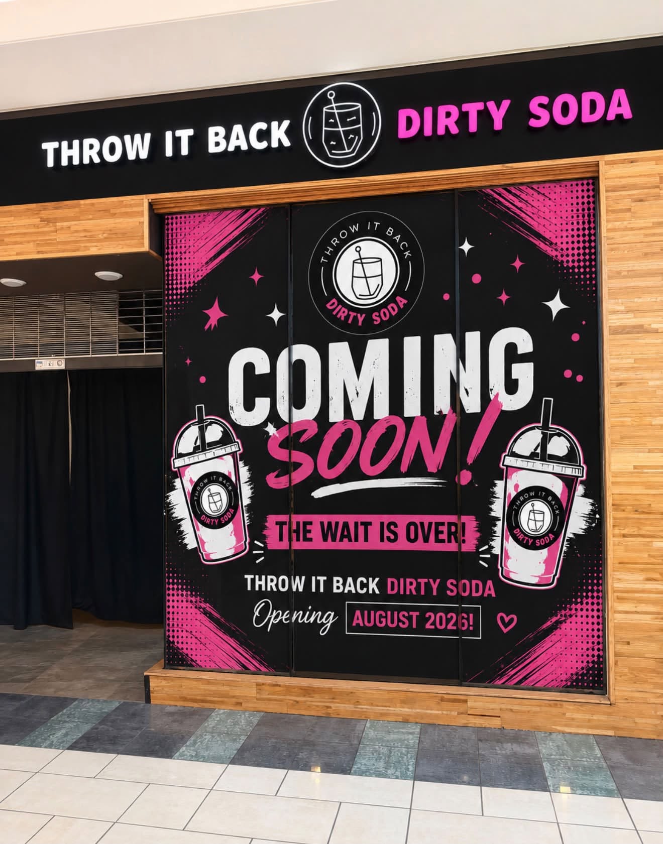 The Throw It Back Dirty Soda storefront inside Rivertown Crossings Mall in Grandville, MI, with signage reading "Coming Soon — the wait is over, opening August 2026"